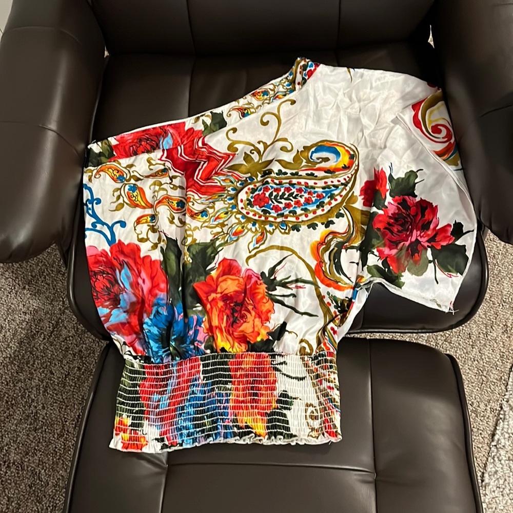 Dressy shirt. Size med. one side is sleeveless